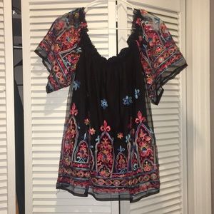 Colorful, embroidered, off-the-shoulder blouse